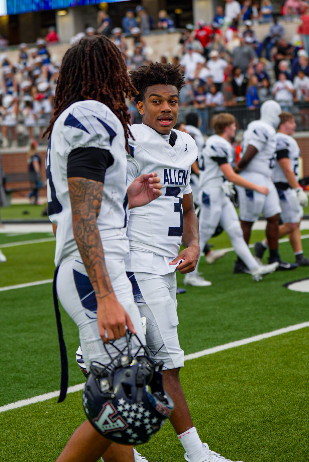 Allen players talking on the sideline